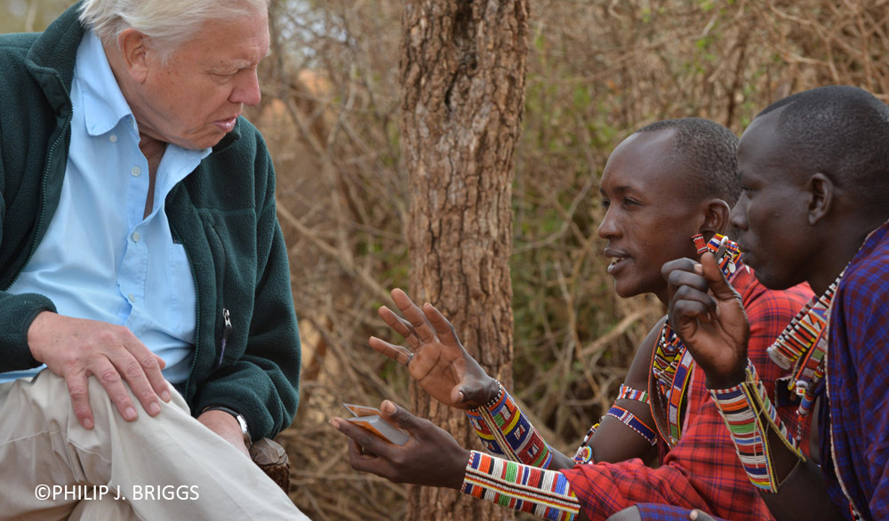 Sir David Attenborough learning about the Lion Guardians program from Lion Guardian Olubi